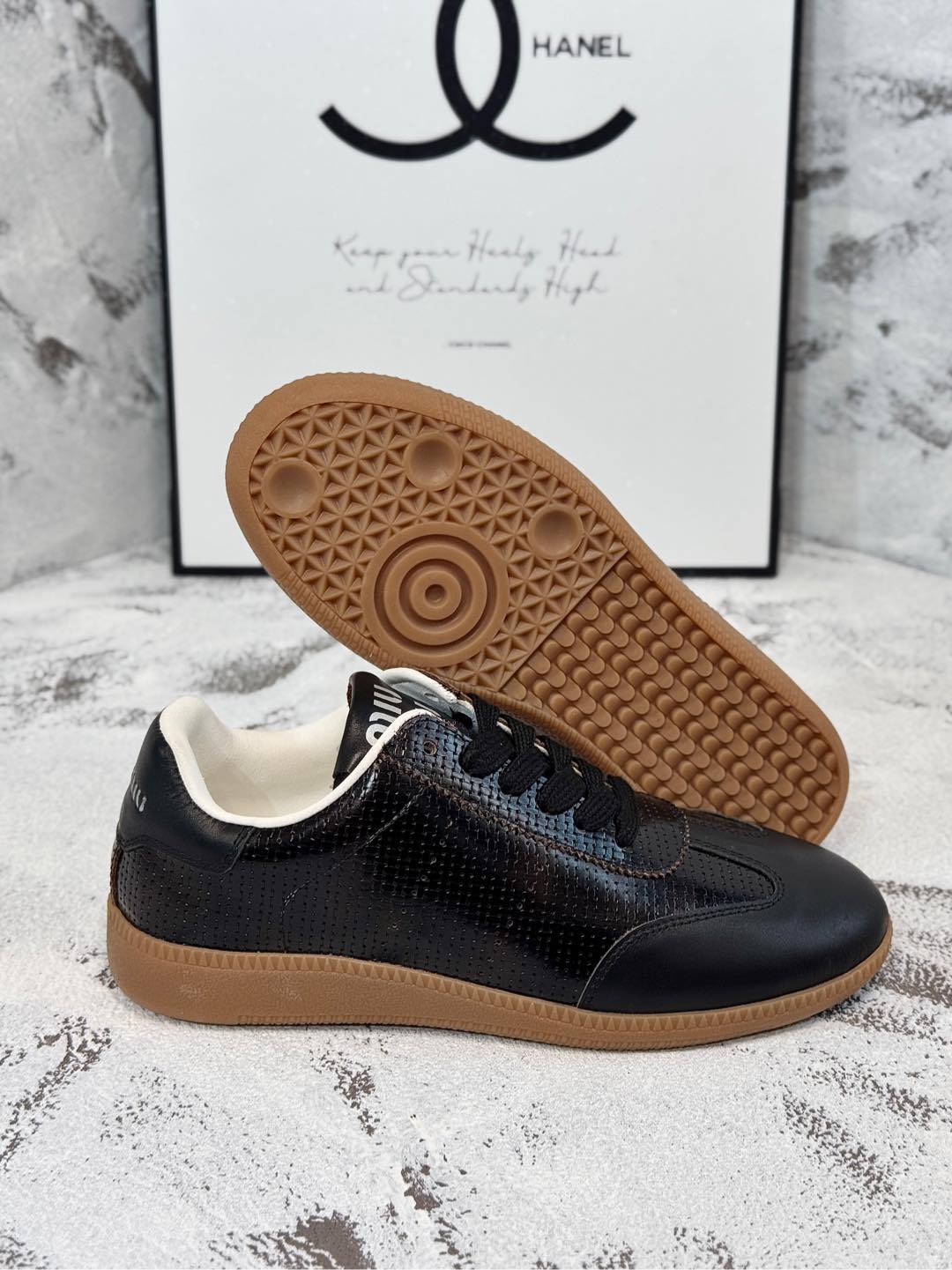 RETRO SNEAKERS IN BLACK LAMBSKIN WITH KNITTED PATTERN