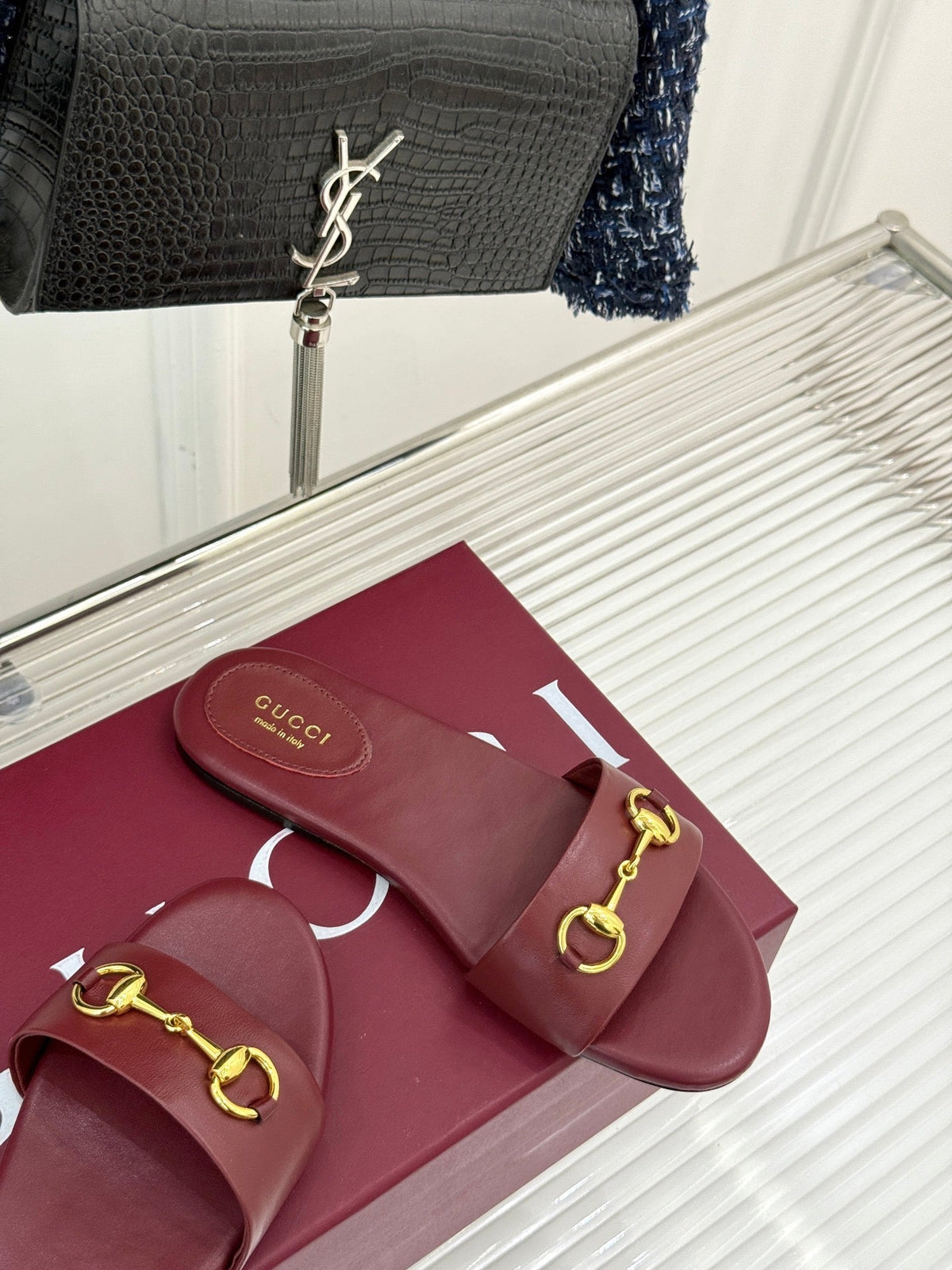 SLIDE SANDALS IN RED CALFSKIN WITH GOLD HARDWARE