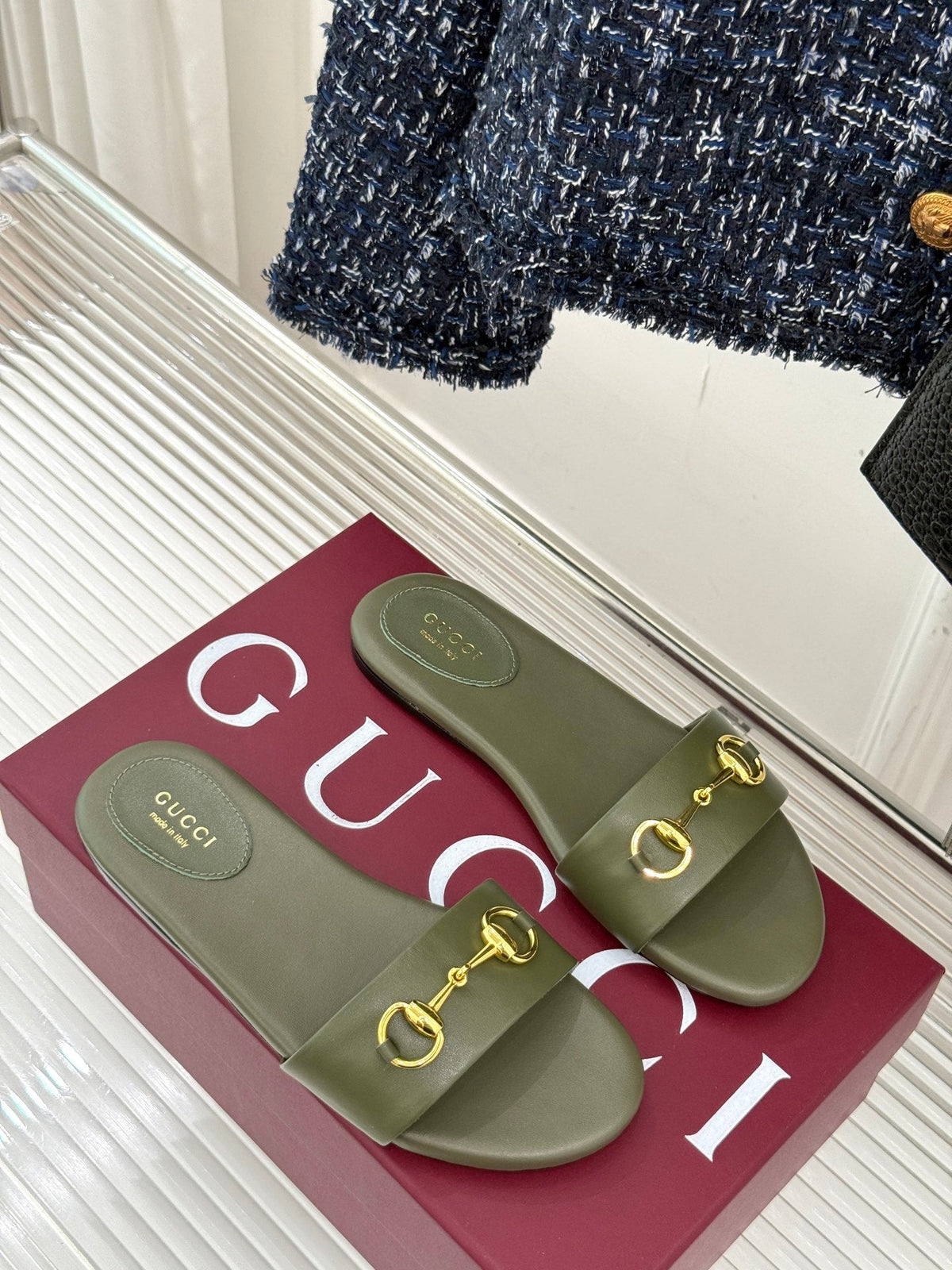 SLIDE SANDALS IN MOSS GREEN CALFSKIN WITH GOLD HARDWARE
