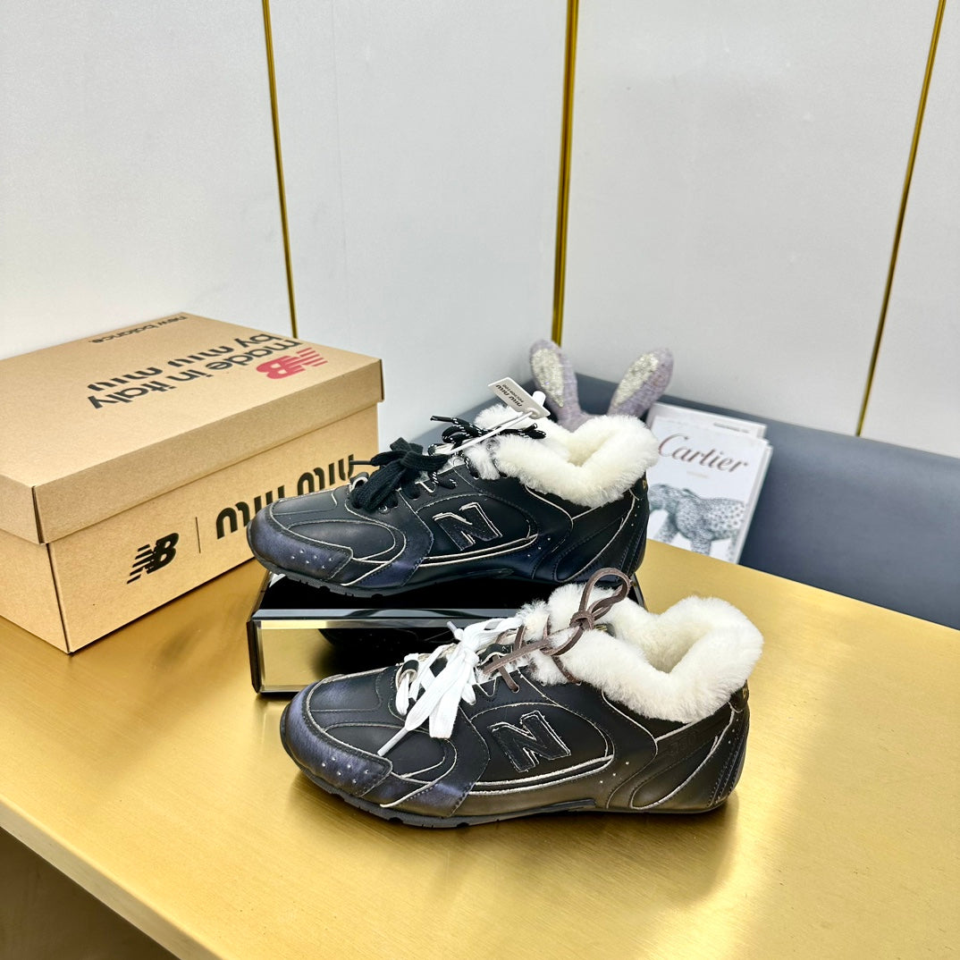 MIUXNB 530 SNEAKERS IN BLACK CALFSKIN SHEARLING