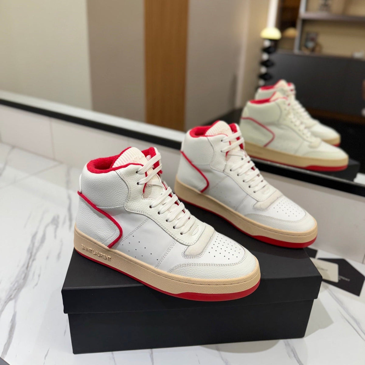 MID-TOP SNEAKERS IN WHITE AND RED TRIM PERFORATED LAMBSKIN
